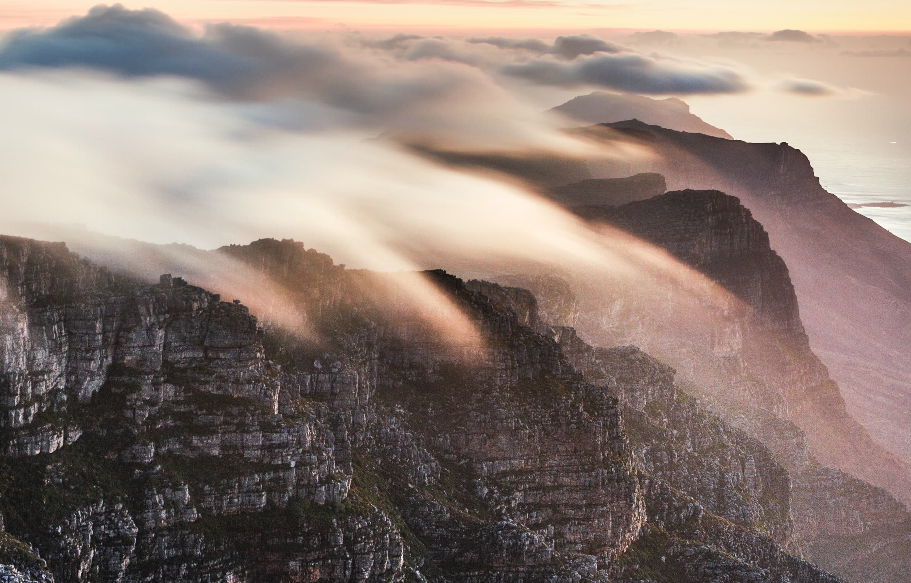 Photo of rolling clouds on Table Mountain, South Africa